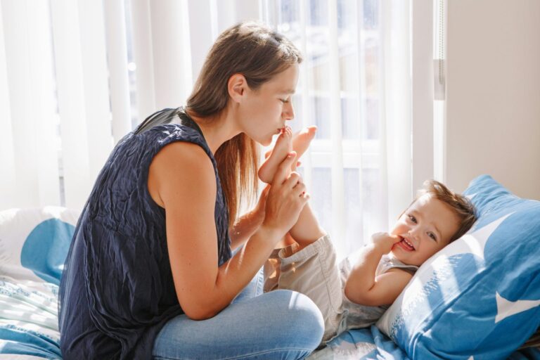 Mother and young child sharing a calm moment at home, representing emotional regulation and stability supported by Neurofeedback