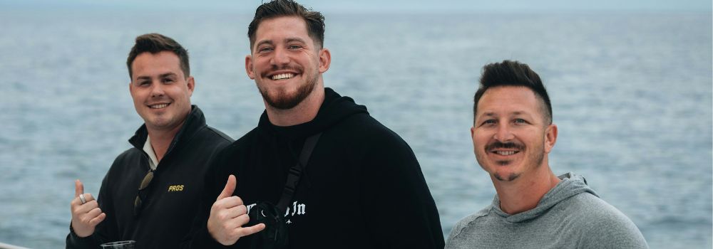Veterans smiling together outdoors, representing happiness, friendship and enjoying life again